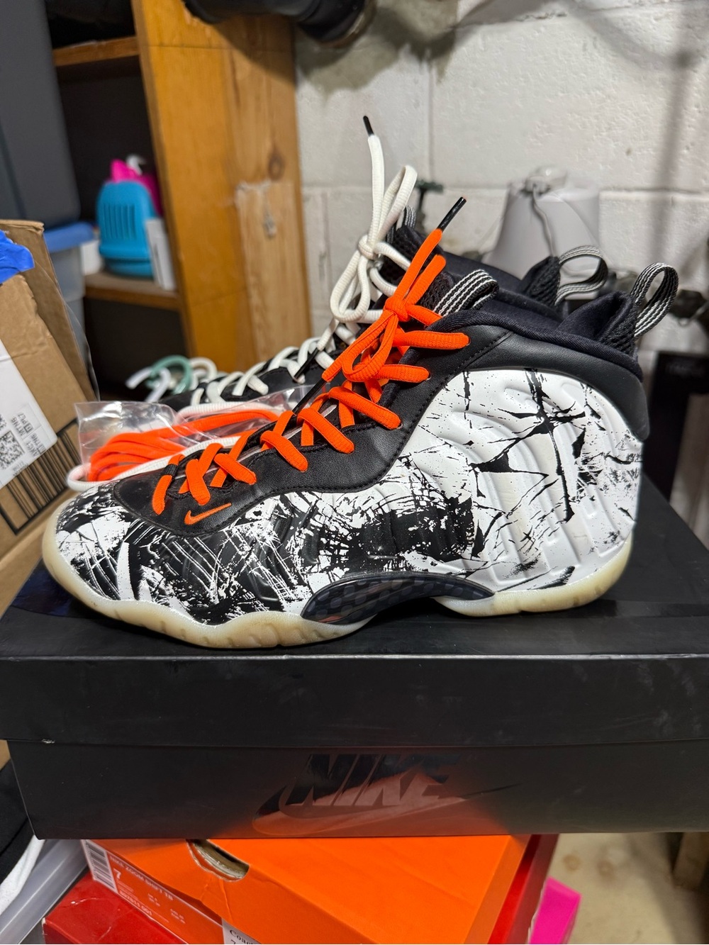Nike Kids Foamposite Sneakers in Black, White & Orange